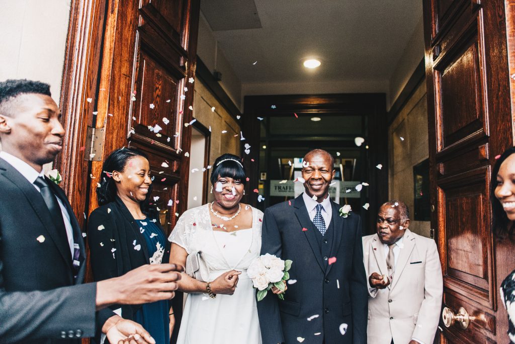 Newlywed couple laughing together after their Sale Town Hall ceremony