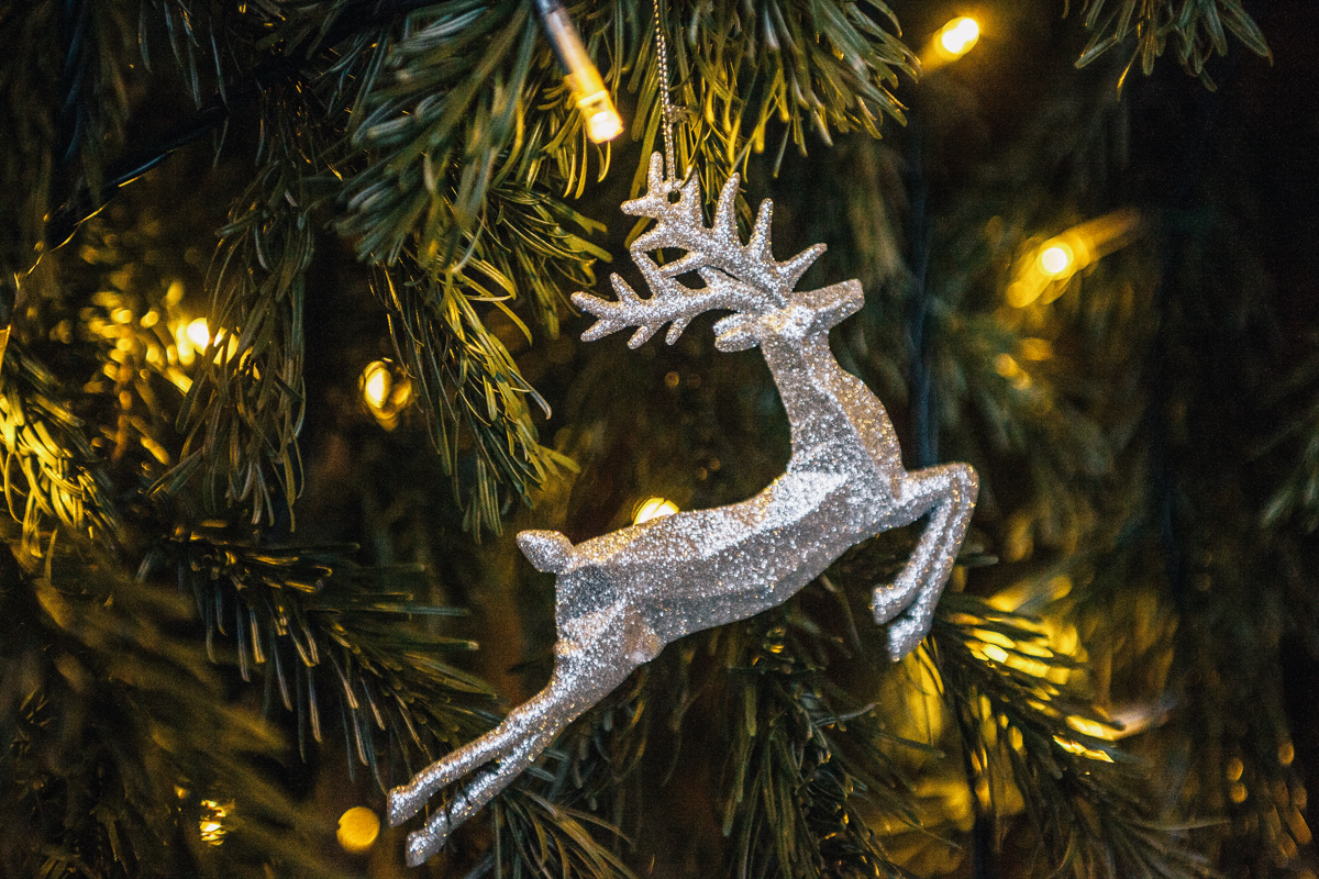 winter wedding reindeer ornament on christmas tree woburn abbey