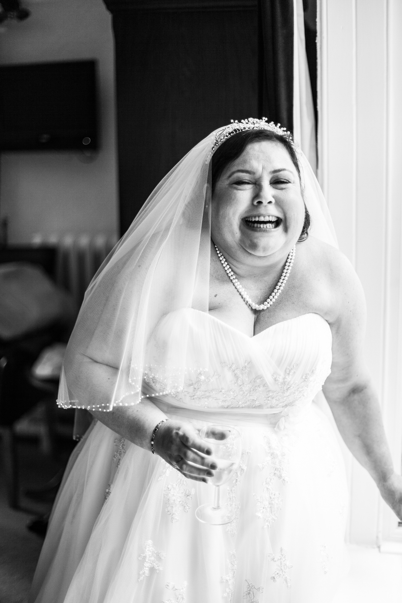 Natural black and white wedding photography capturing real emotion