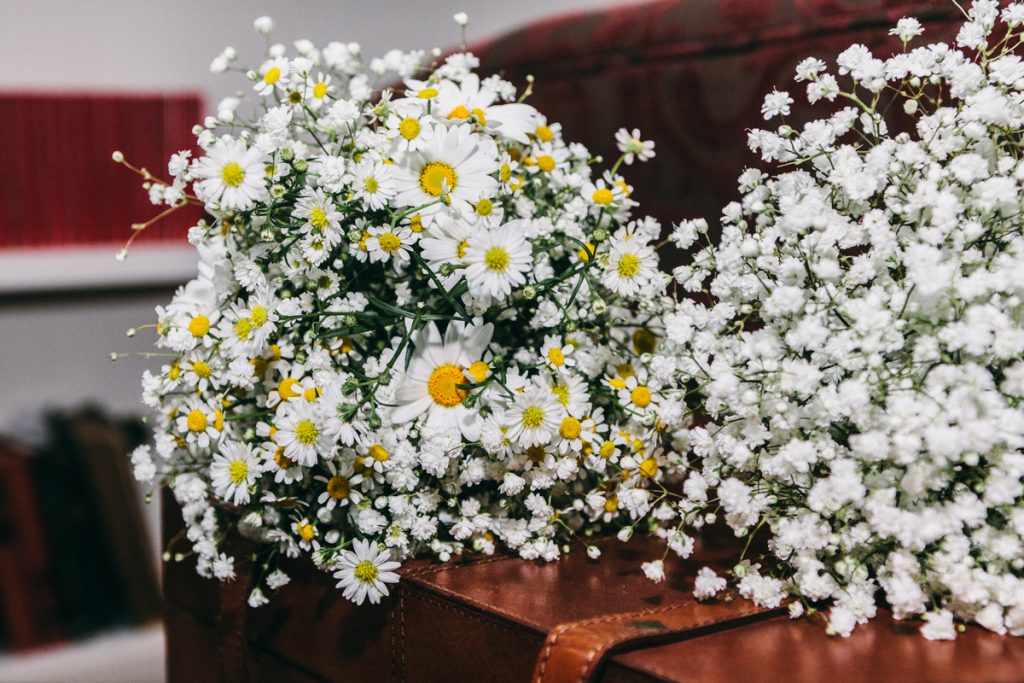 Hand-tied fall bridal bouquet with warm-toned seasonal flowers
