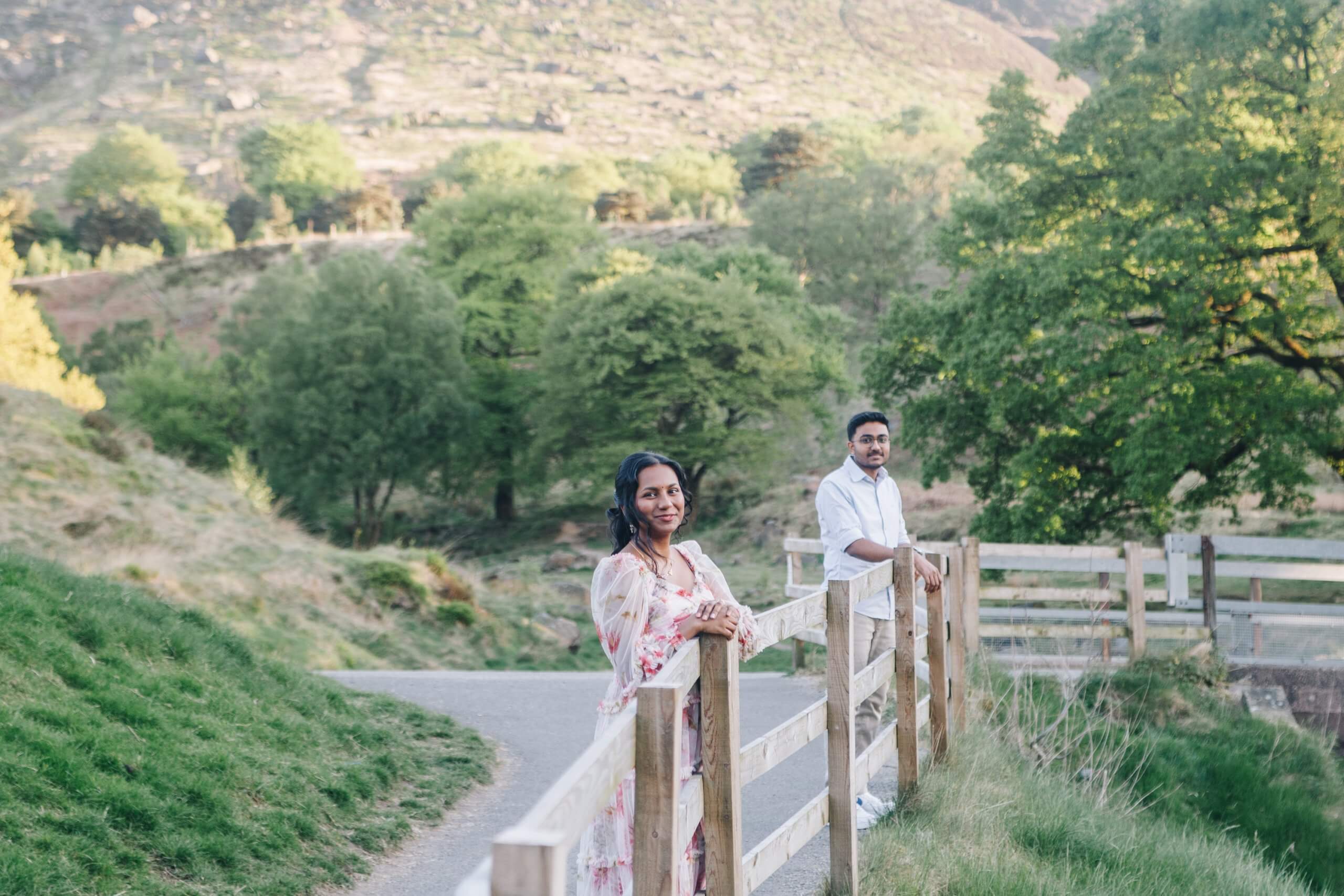 Peak District engagement photographer capturing Barati and Kartik in the evening light