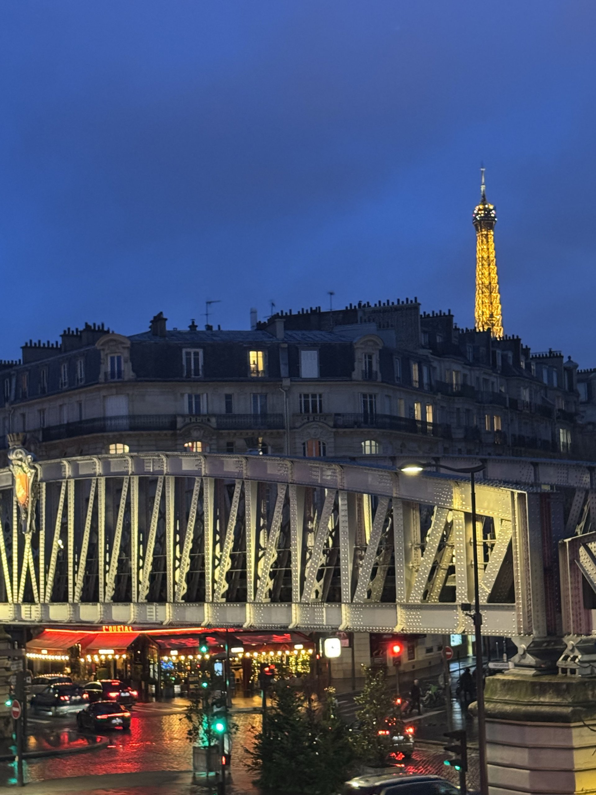 eiffel tower by night from first hotel paris balcony view