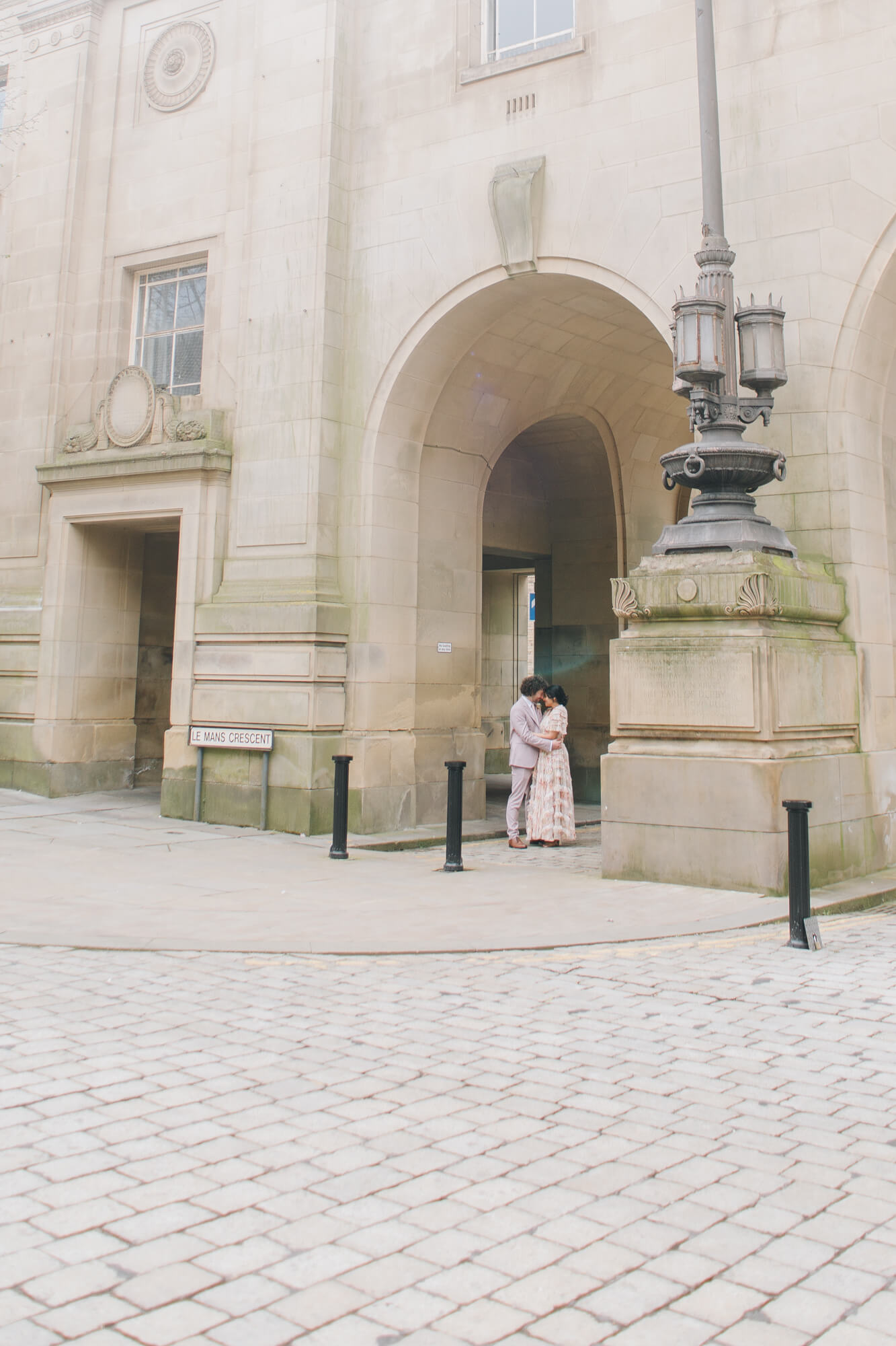 Romantic couple portraits at Bolton Town Hall by Greater Manchester wedding photographer