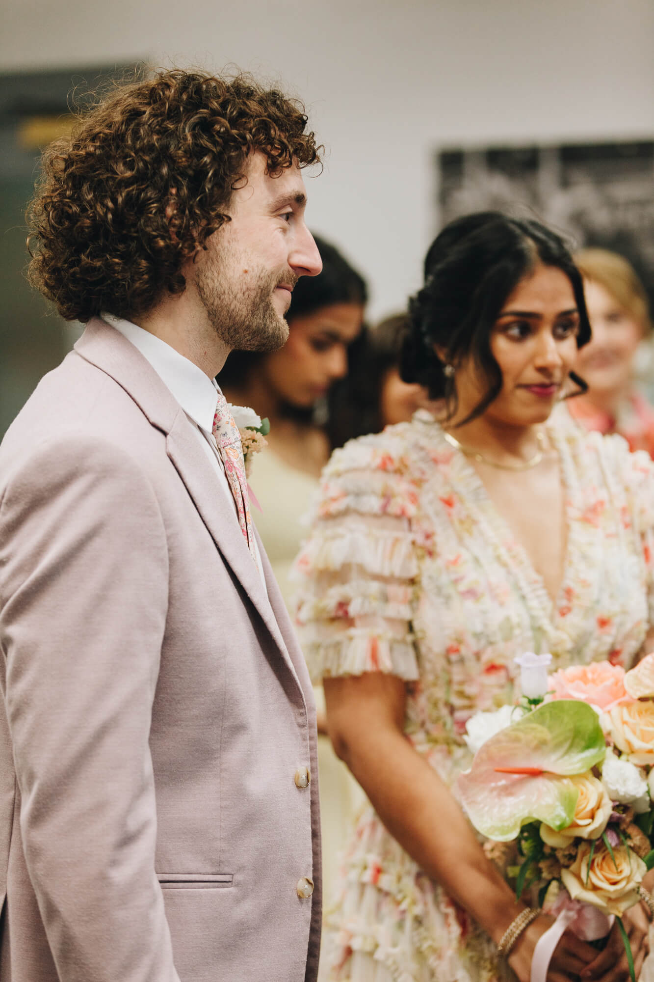 Couple smiling during civil wedding at Albert Rooms Bolton Bolton wedding photographer