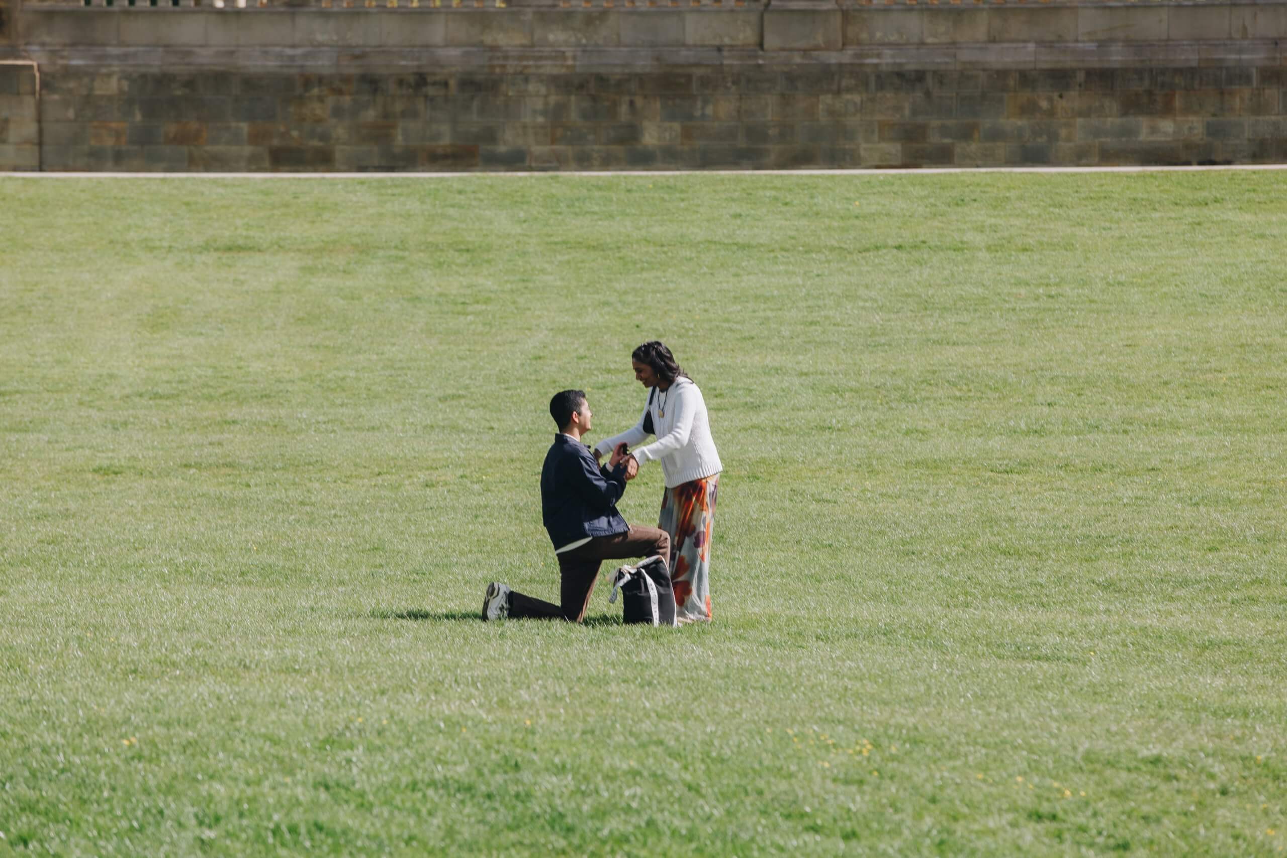 Candid emotional engagement photos in English countryside setting