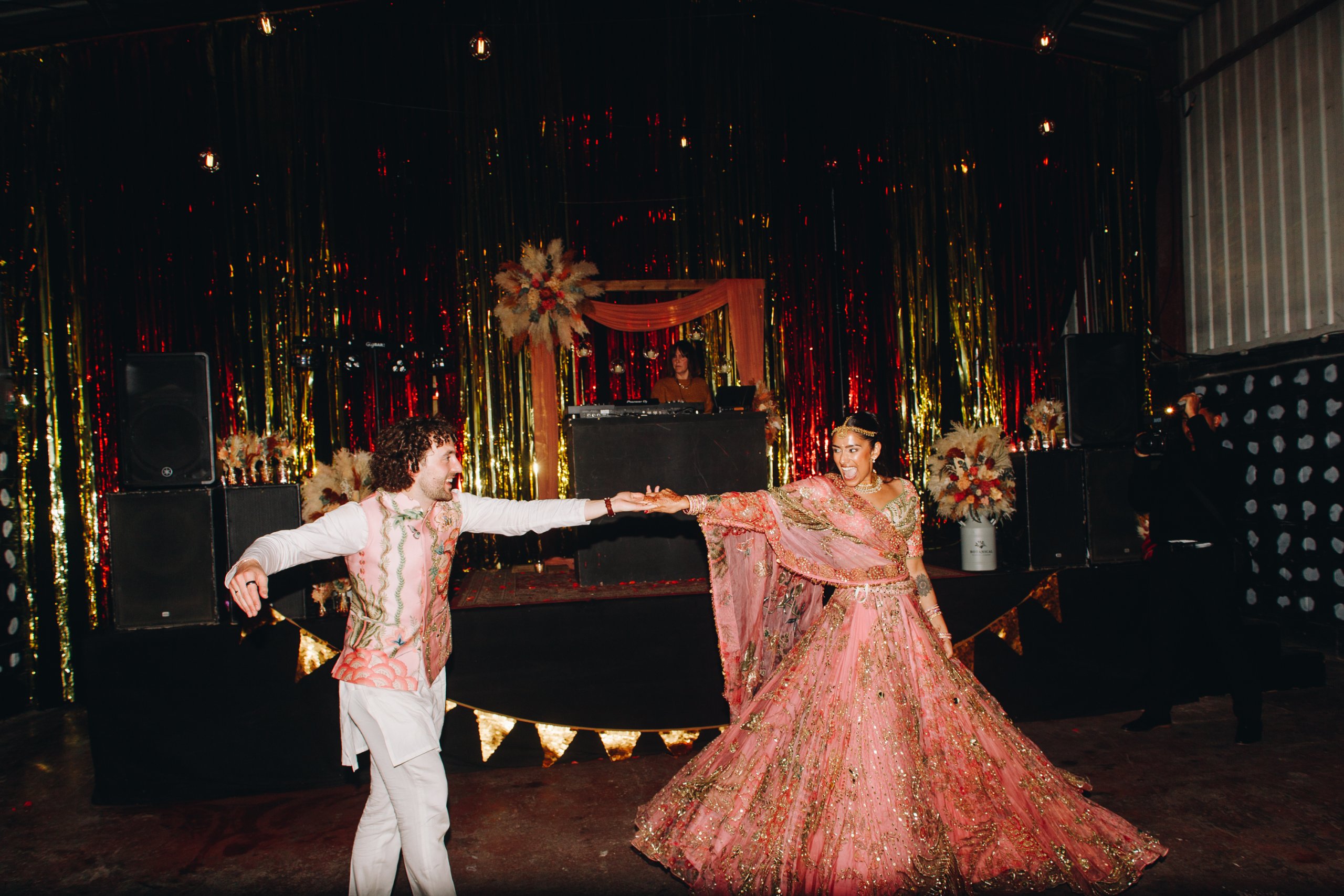 Bride and groom on dance floor at wedding reception