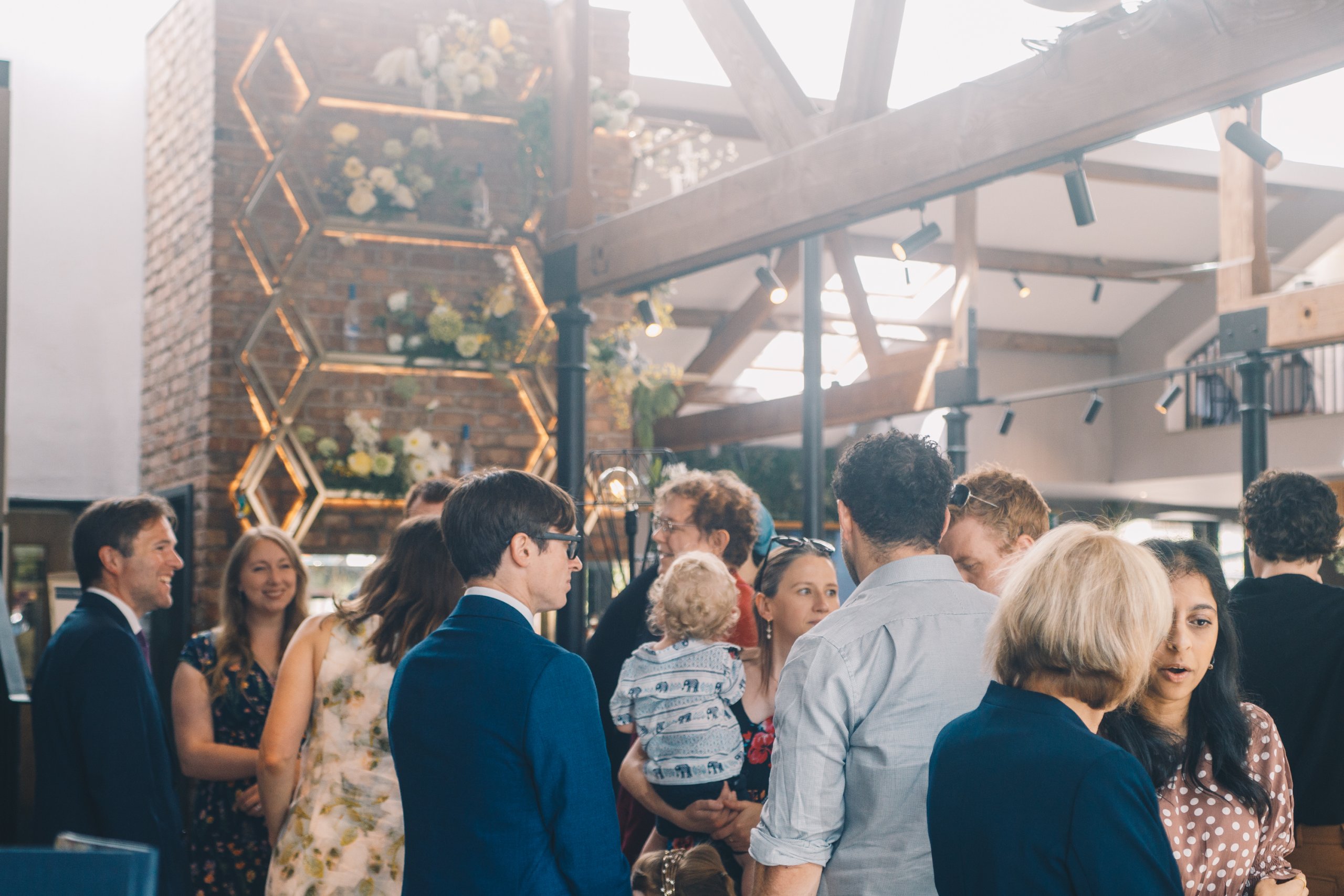 Guests celebrating during drinks reception at Castlefield Rooms