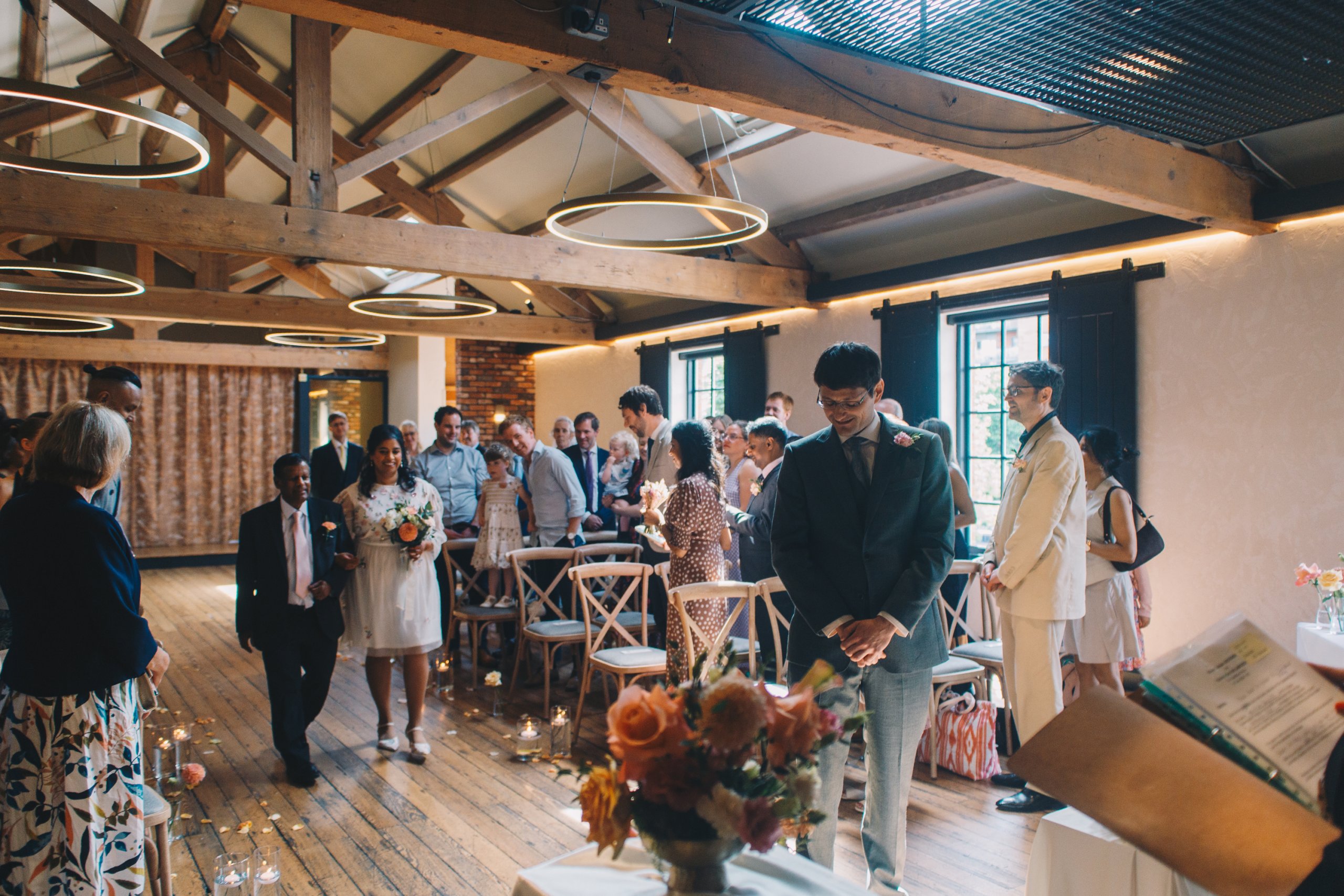 Bride walking down the aisle at The Castlefield Rooms Manchester