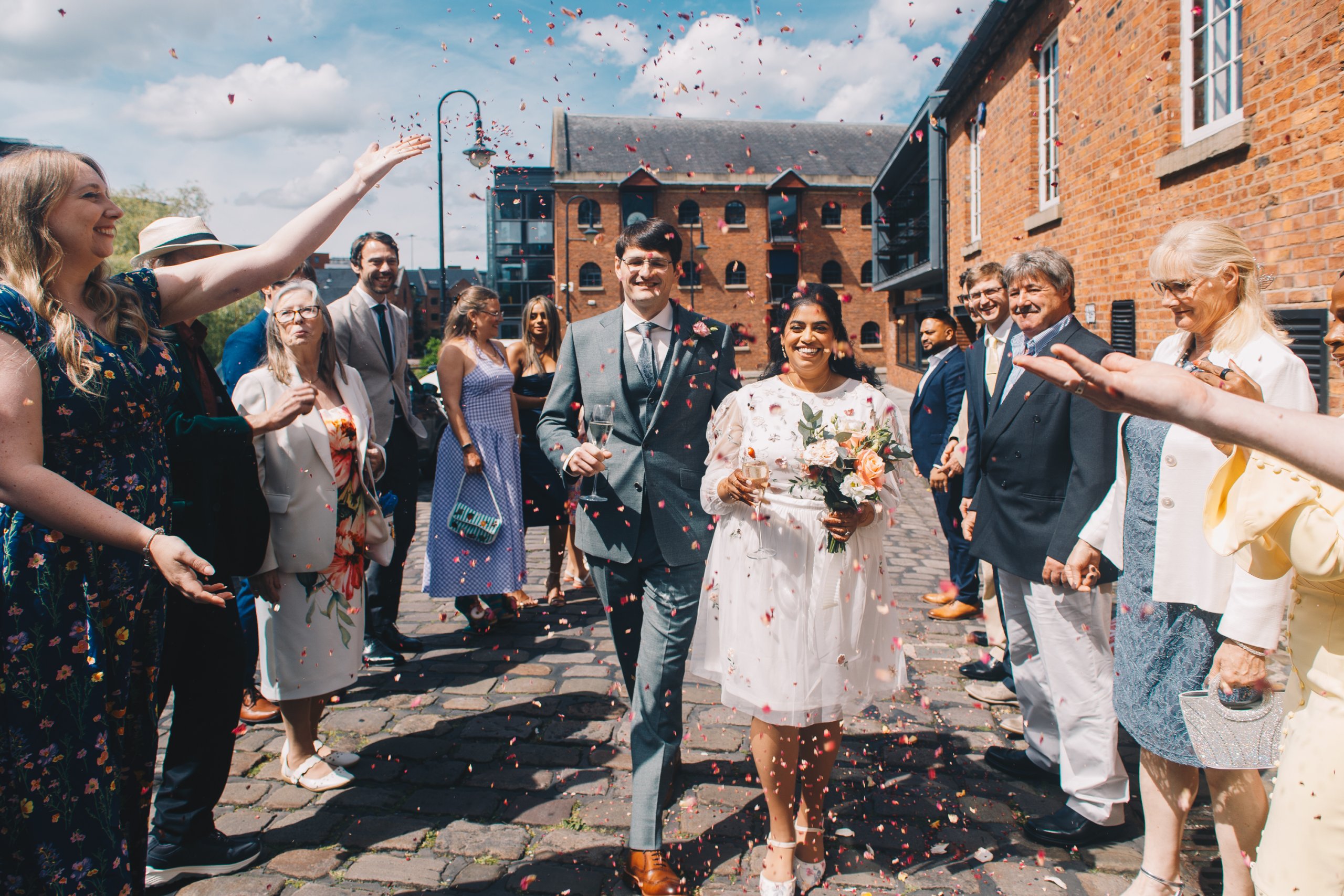 Confetti moment outside The Castlefield Rooms wedding venue