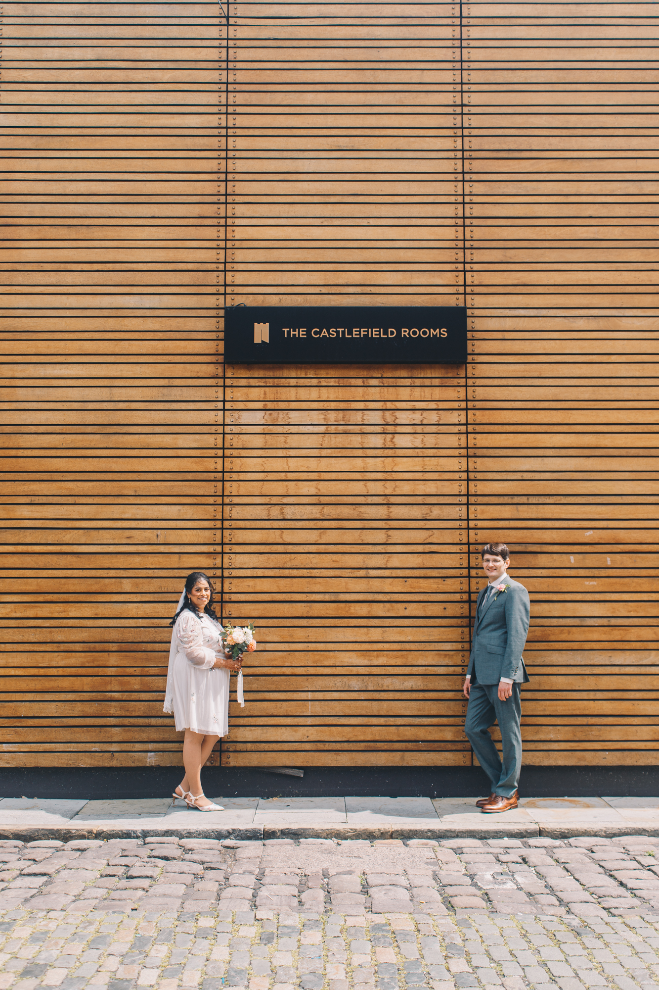 Romantic wedding portraits outside The Castlefield Rooms