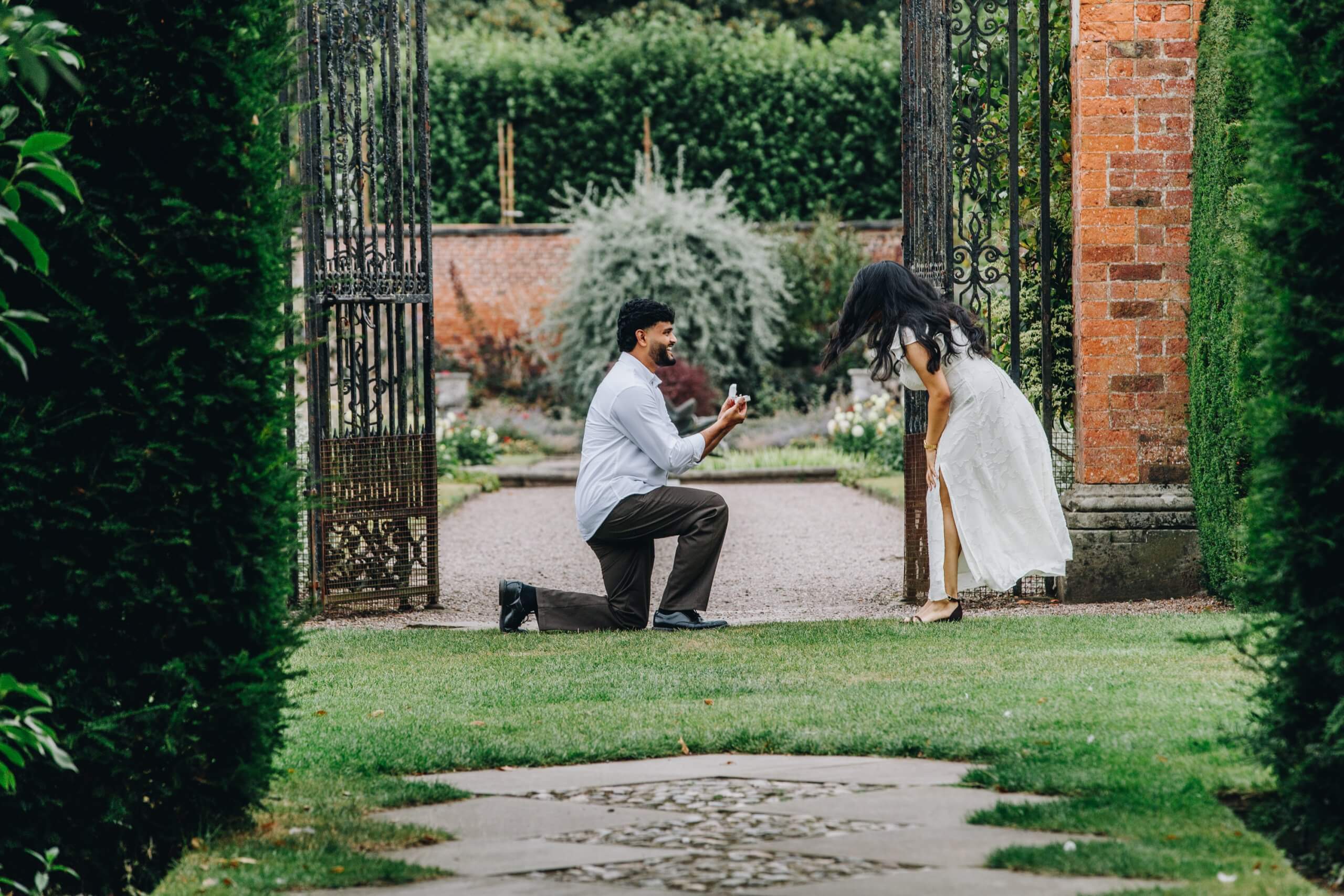 Blessy and Abin during their proposal at Arley Hall Gardens in Cheshire
