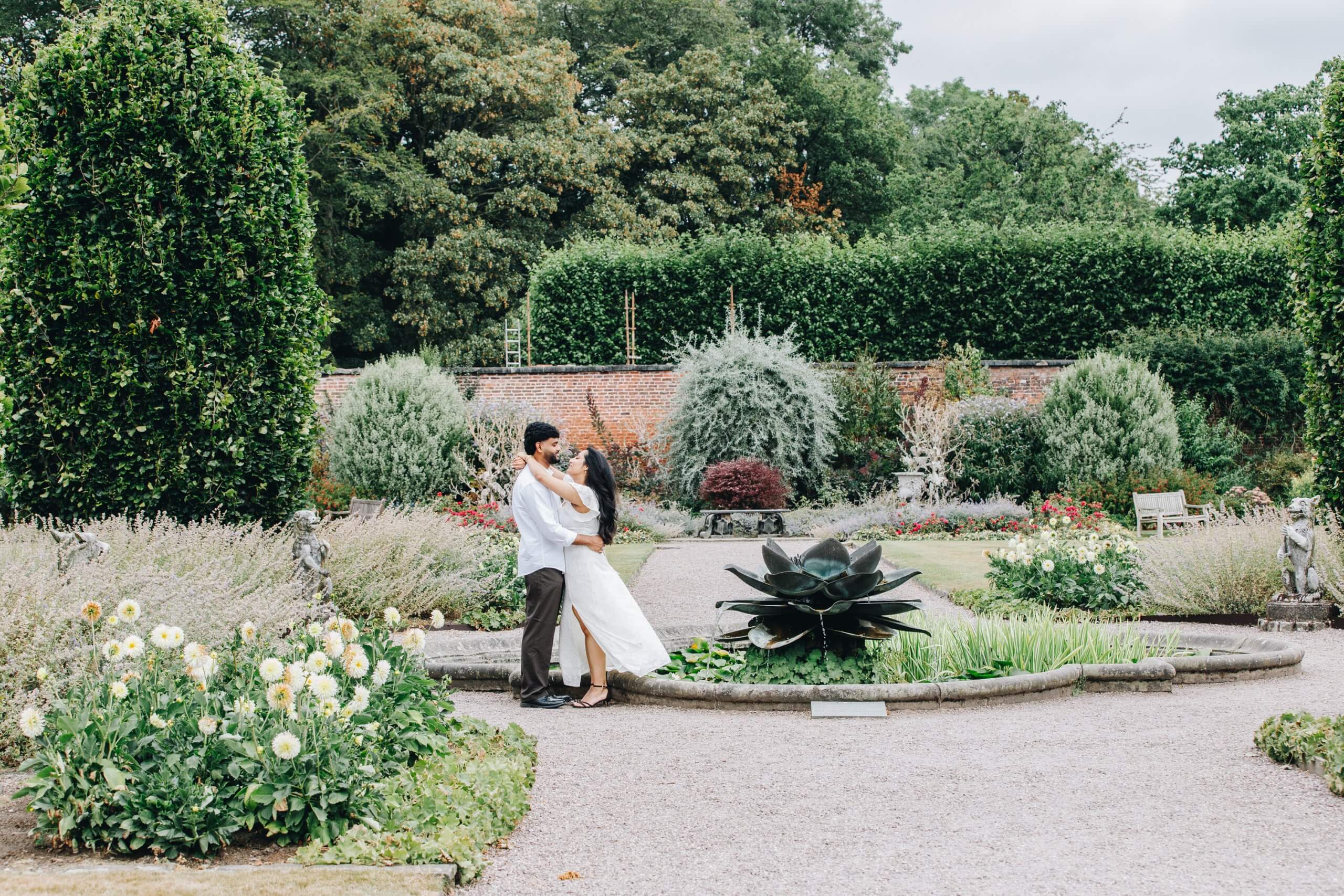 Blessy and Abin walking through Arley Hall Gardens