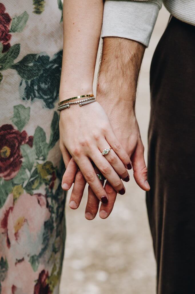 Daniella and Lucas embracing during their Chatsworth House engagement photoshoot