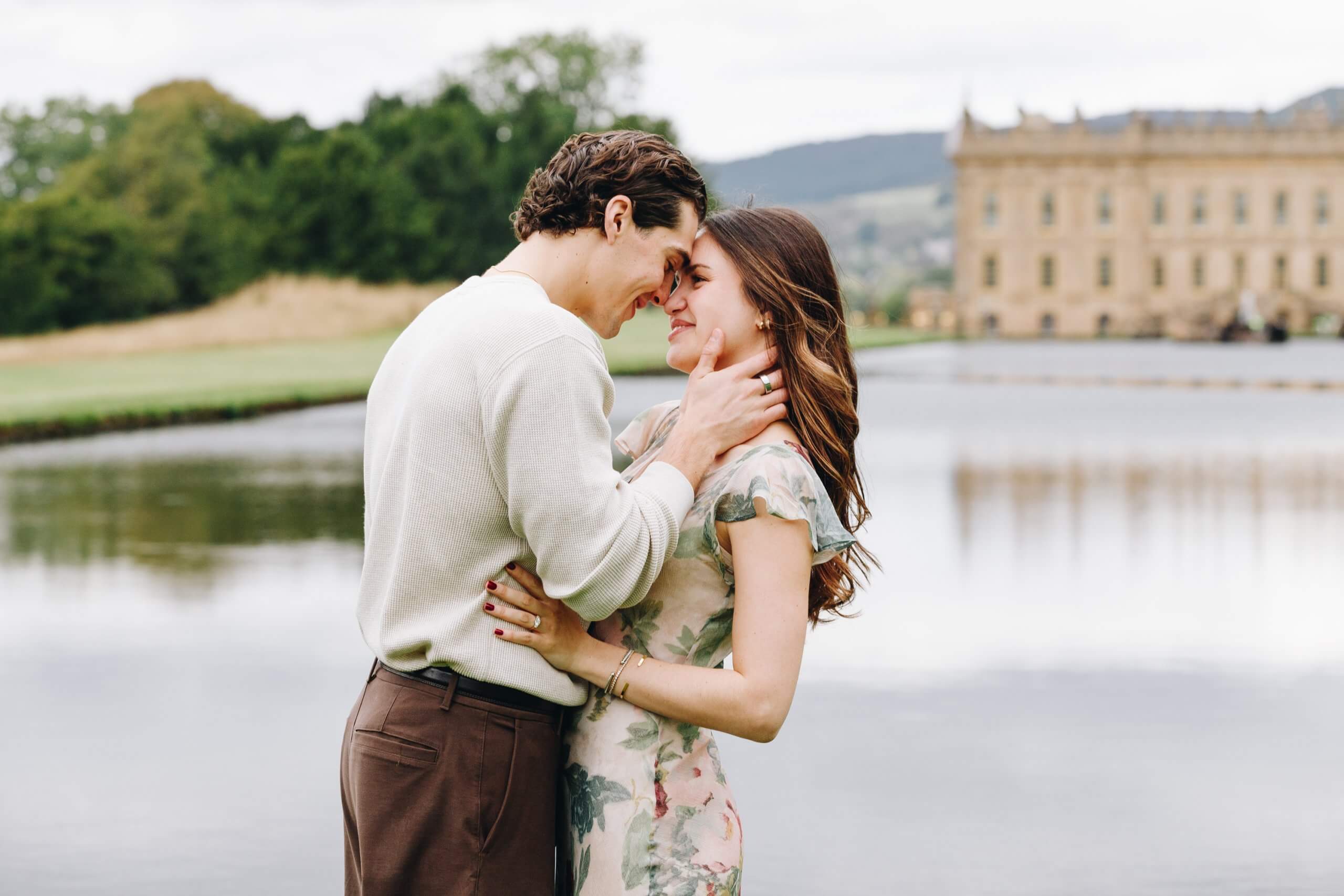 Newly engaged couple photographed at the Emperor Fountain in the Chatsworth gardens